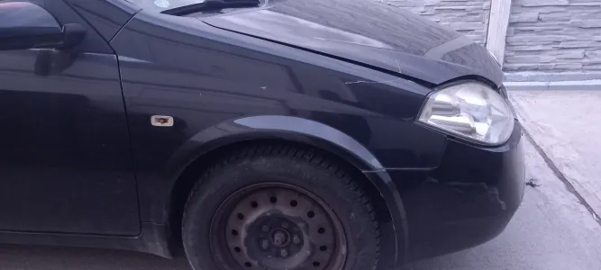 Aripa nissan primera p12 d.